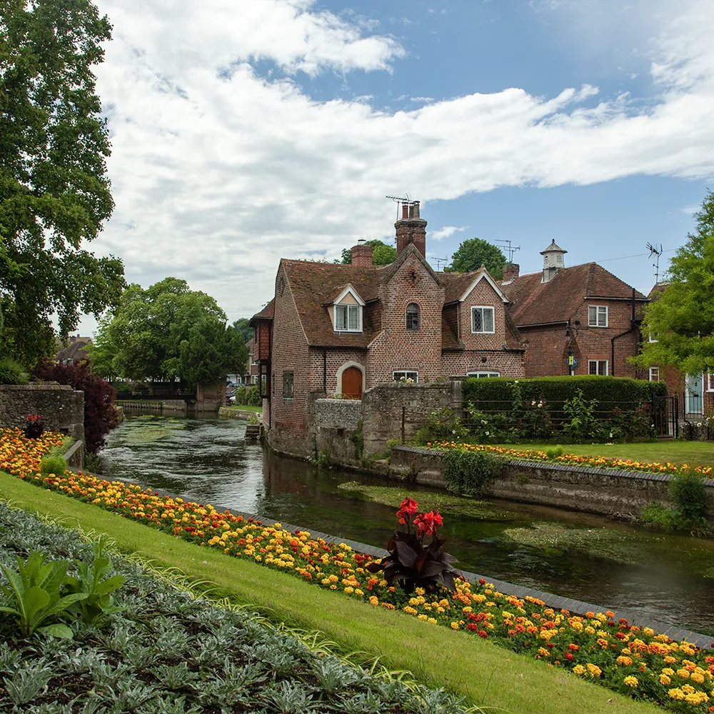 A vibrant, green lawn created with professional artificial grass installation by Pinpoint Contracts.